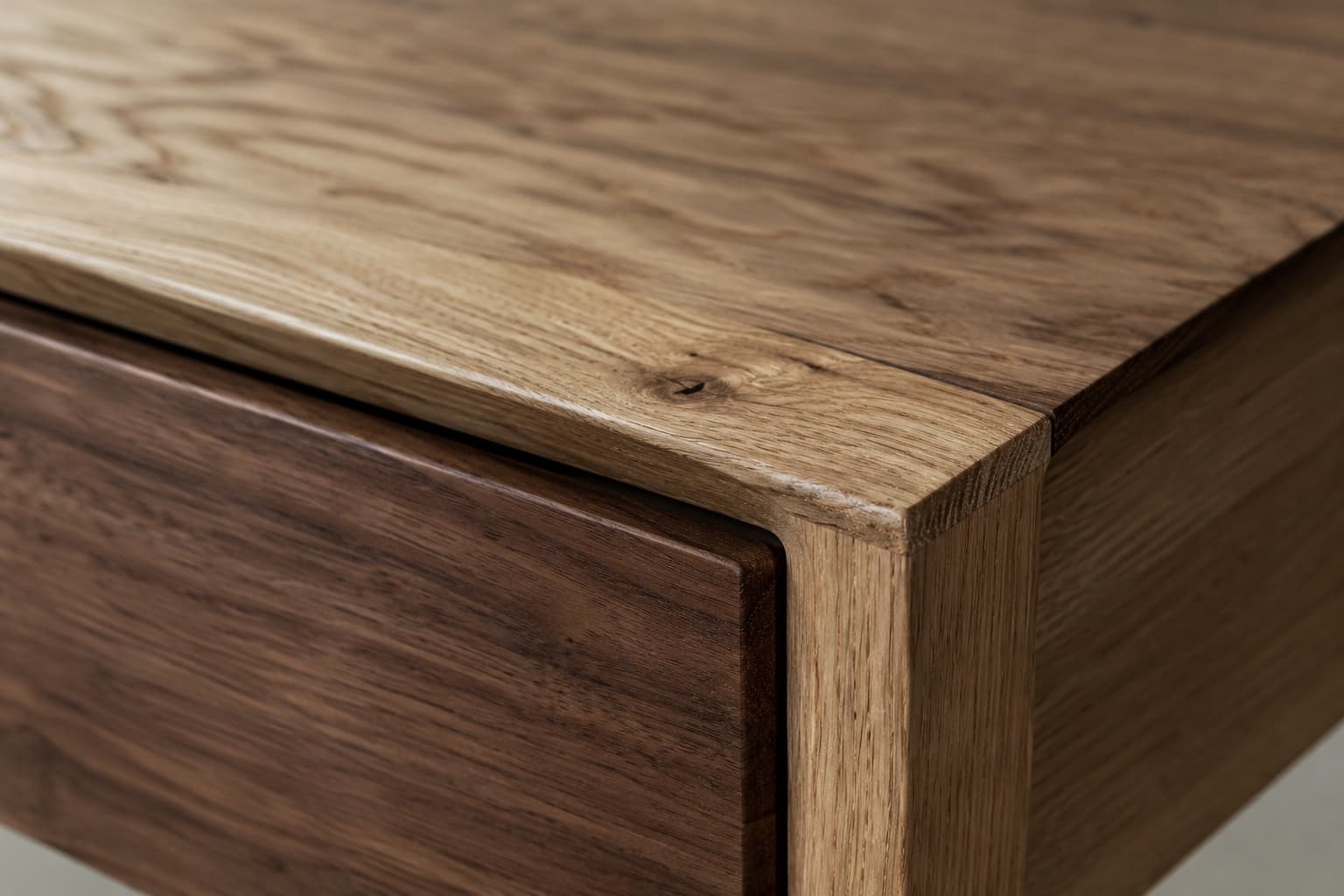 Close view of natural oak and walnut grain, colour variation and a small knot